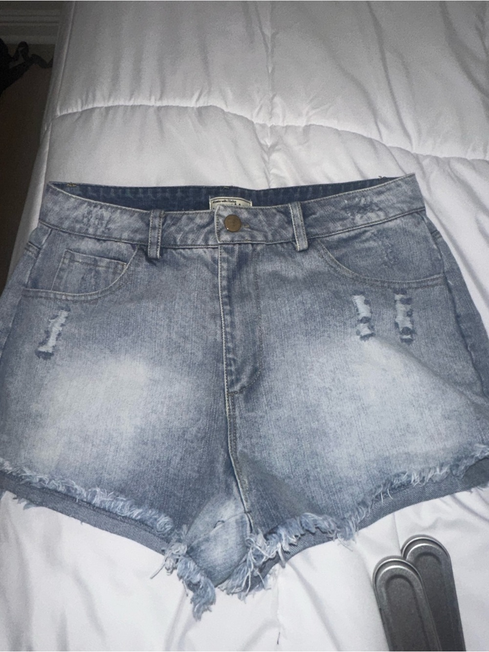 Mid-Waist Light Wash Distressed Denim Shorts - Women